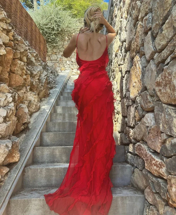 Robe longue femme soirée en chiffon léger, bretelles fines, volants fluides pour un look élégant et féminin.