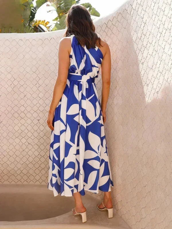 Robe longue femme à une épaule, en polyester léger, avec ceinture ajustable et drapé élégant pour un look chic.