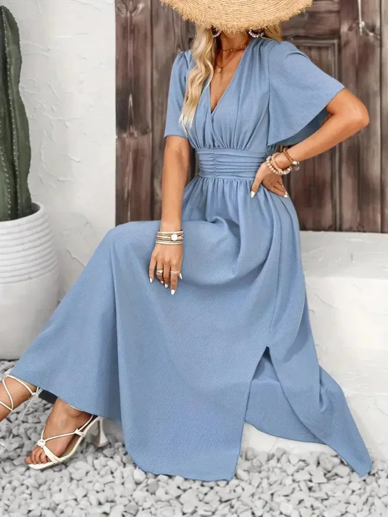 Robe longue femme en tissu léger, volants au col V, ceinture ajustable pour un ajustement personnalisé.