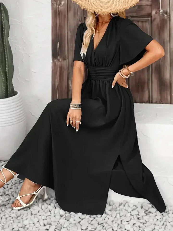 Robe longue à volants, col V, en tissu léger, avec ceinture ajustable pour un fit personnalisé et élégant.