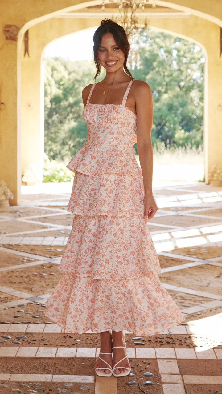 Robe longue femme à volants, en coton léger, avec bretelles larges et design fluide, parfaite pour les journées estivales.