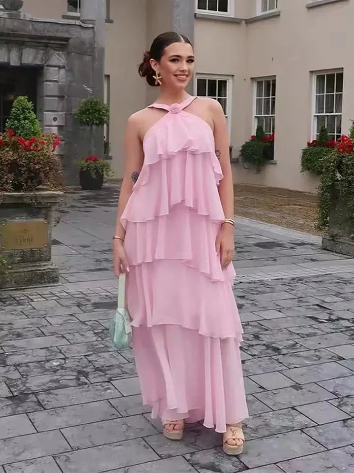 Robe longue rose pour femme, en tissu léger, avec volants et ceinture nouée à la taille, idéale pour les journées…