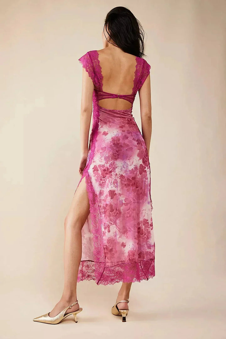 Robe maxi femme en dentelle florale transparente avec design cache-cœur, idéale pour une allure élégante et féminine.
