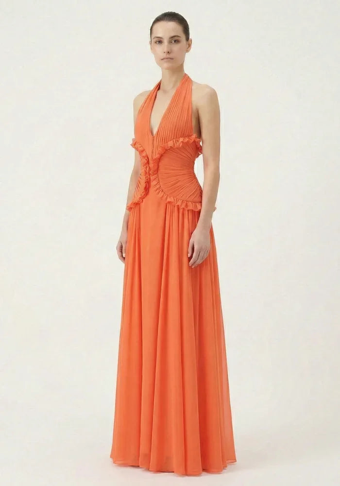 Robe maxi femme orange en coton léger, avec des volants fluides et des bretelles fines, parfaite pour l'été.