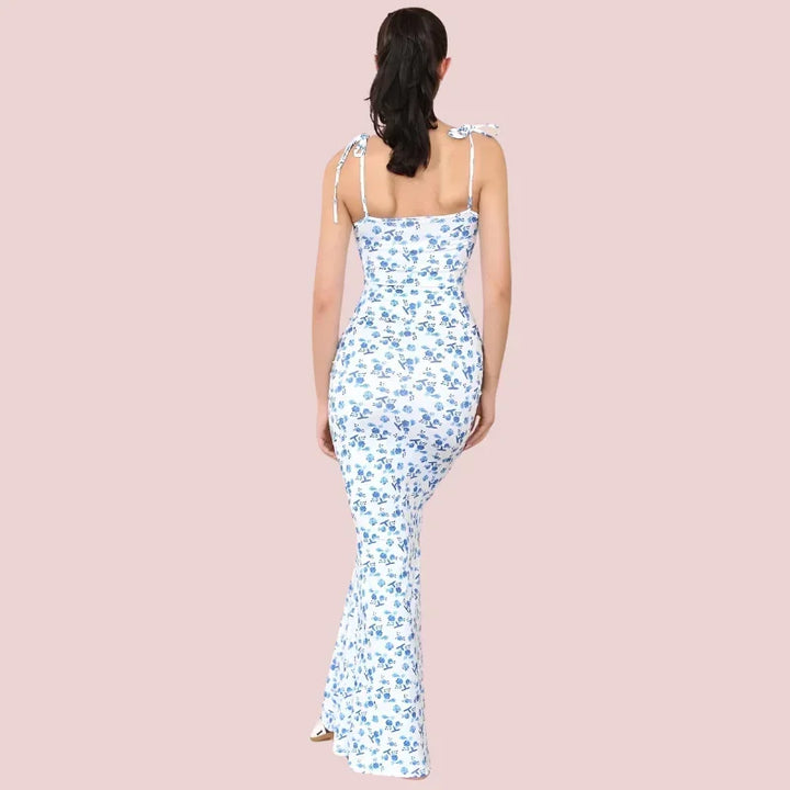 Robe longue fleurie sans manches, en coton léger, bretelles ajustables pour un confort optimal durant l'été.