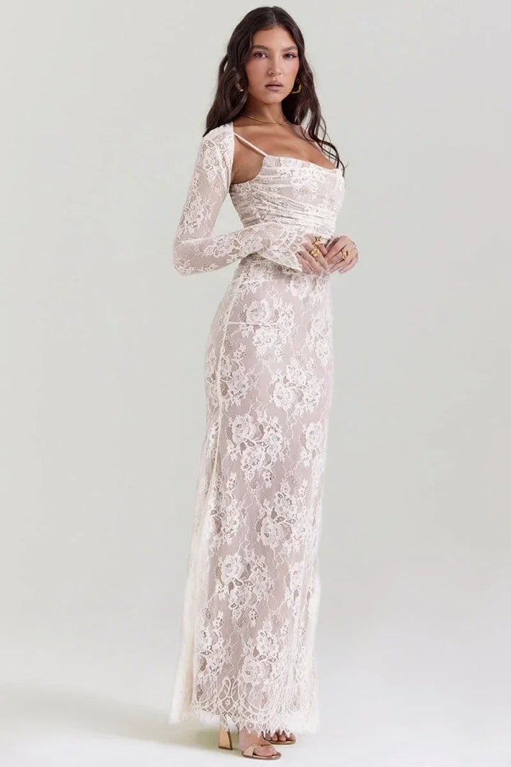 Robe longue à fleurs avec dentelle, manches longues et détails élégants aux épaules, idéale pour cérémonies et soirées.
