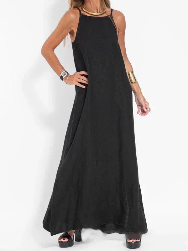 Robe longue sans manches en tissu léger, avec une coupe fluide idéale pour un style décontracté cet été.
