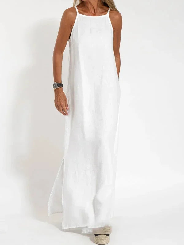 Robe longue sans manches en tissu léger, coupe fluide, parfaite pour un style décontracté cet été.