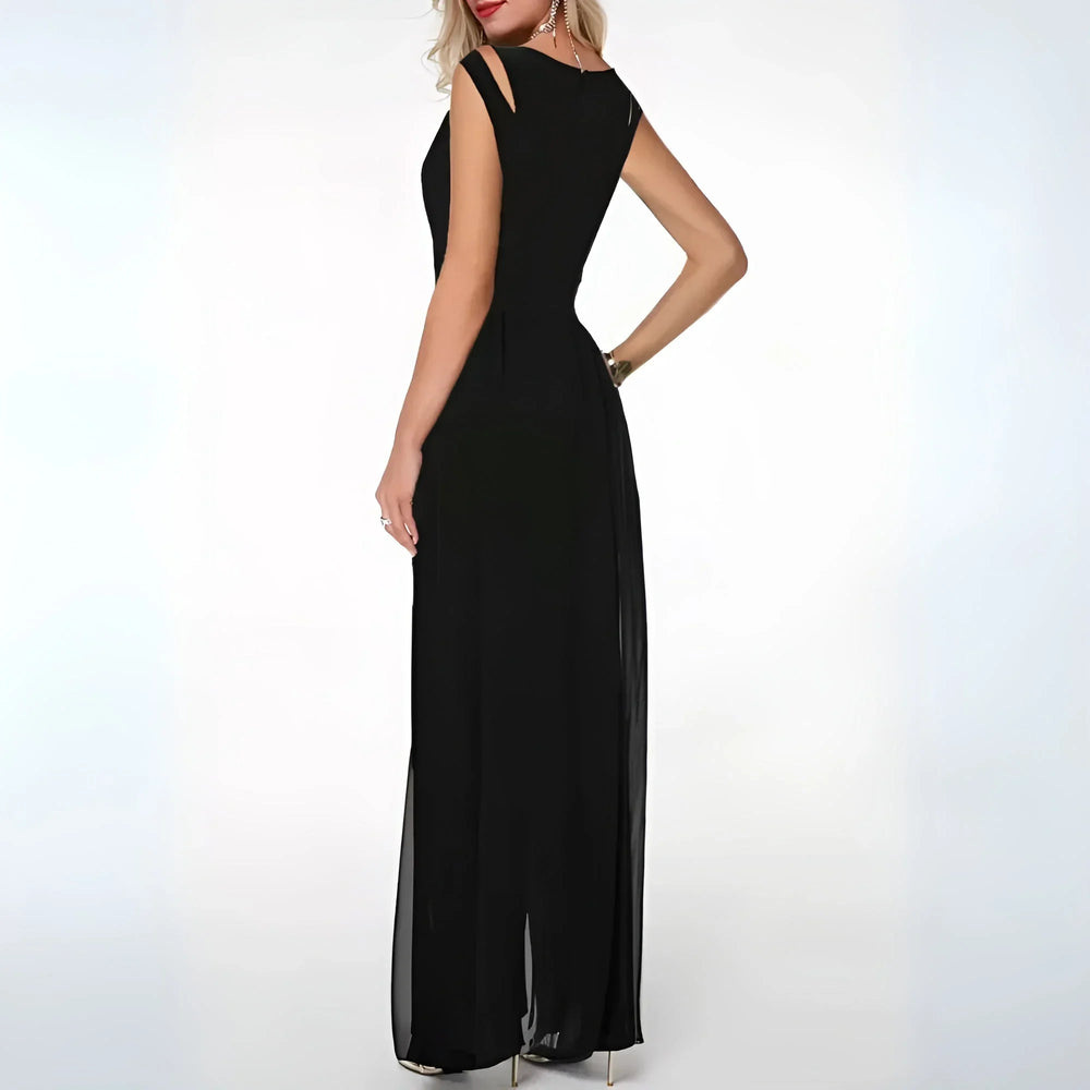 Robe longue sans manches avec découpes latérales, réalisée en tissu fluide pour un confort et un style élégant.