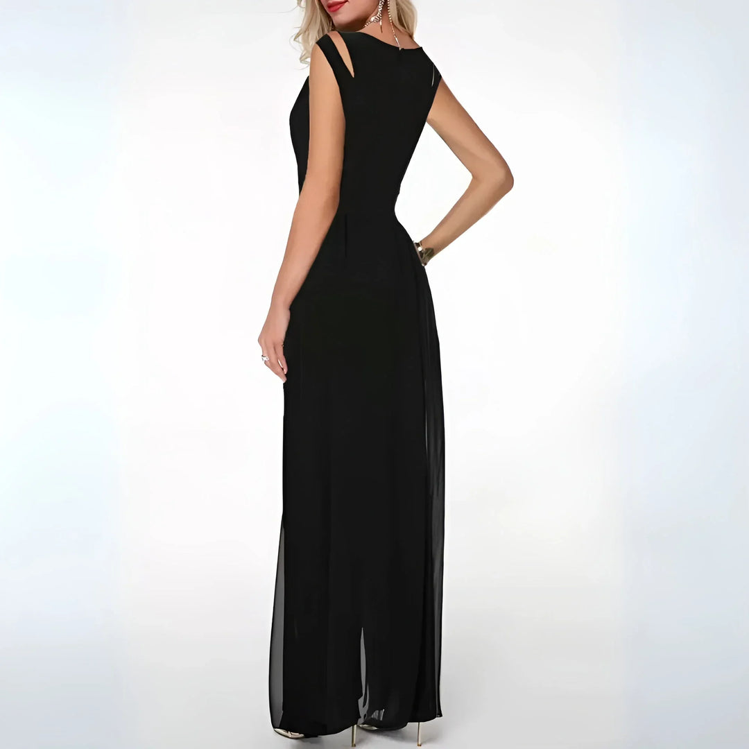 Robe longue sans manches avec découpes latérales, réalisée en tissu fluide pour un confort et un style élégant.