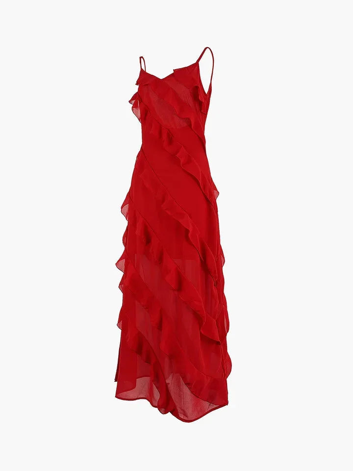 Robe longue asymétrique à volants, bretelles fines, en tissu léger et fluide, parfaite pour une soirée élégante.