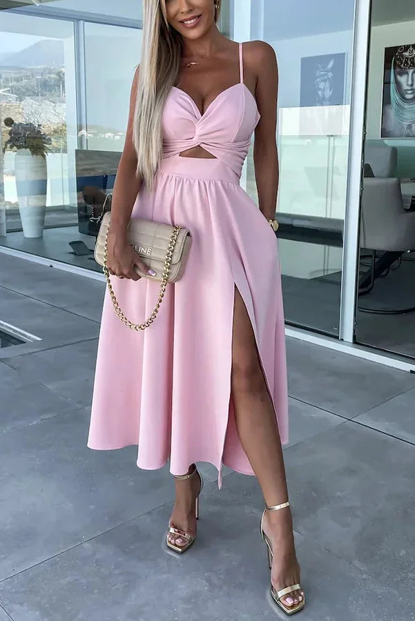 Robe midi décontractée en coton, avec découpes, poches latérales et une longue fente pour plus de confort et de style.