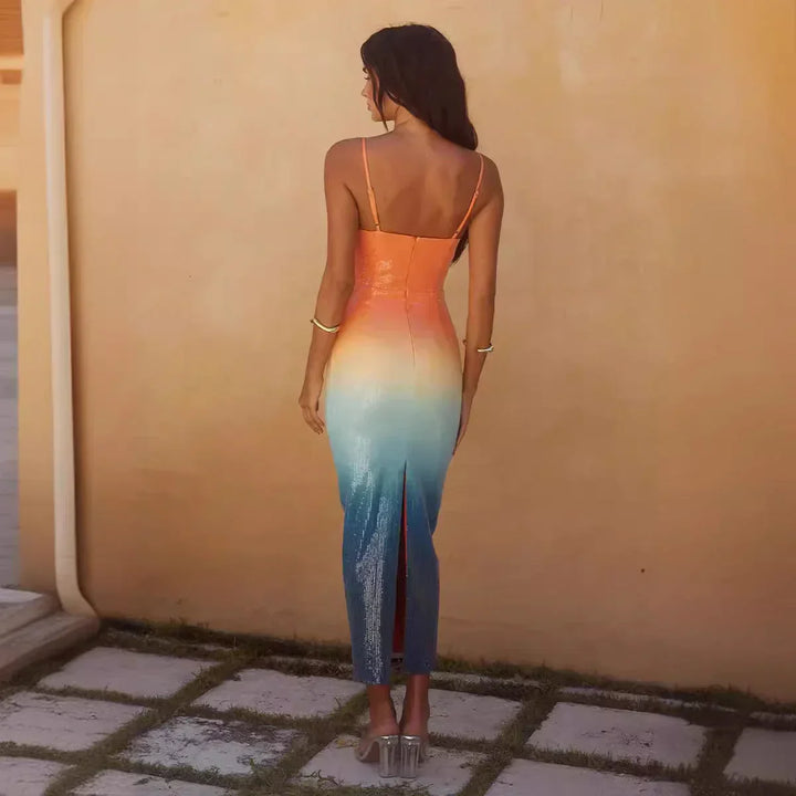 Robe midi sans manches dégradée orange et bleue avec motif étoile de mer, idéale pour les soirées d'été.