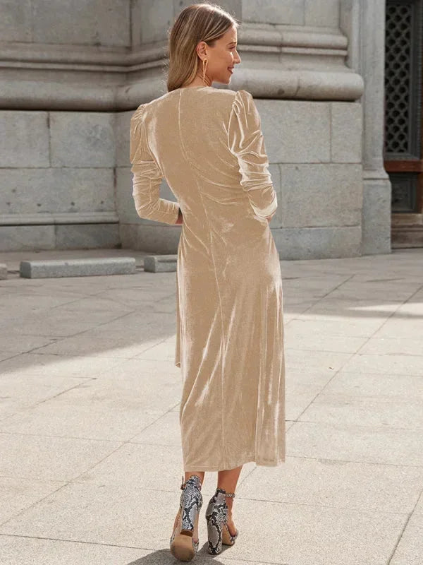 Robe midi femme cache-cœur en coton, manches bouffantes, avec détails noués à la taille et imprimé floral discret.