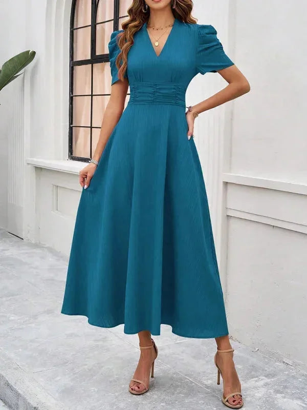 Robe midi femme en tissu léger, col V, manches bouffantes avec motif floral, idéale pour les occasions décontractées.