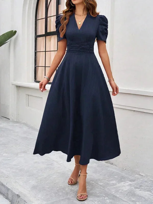 Robe midi femme en coton, col V, manches bouffantes, avec imprimé floral, idéale pour les sorties décontractées.
