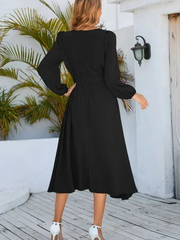 Robe midi femme à manches longues en tissu léger, dotée d'un nœud décoratif à la taille pour une allure élégante.