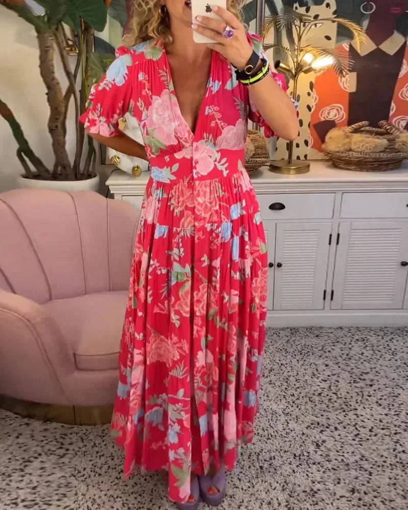 Robe midi femme à motifs floraux, manches courtes, en coton léger, avec ceinture cintrée pour un ajustement flatteur.