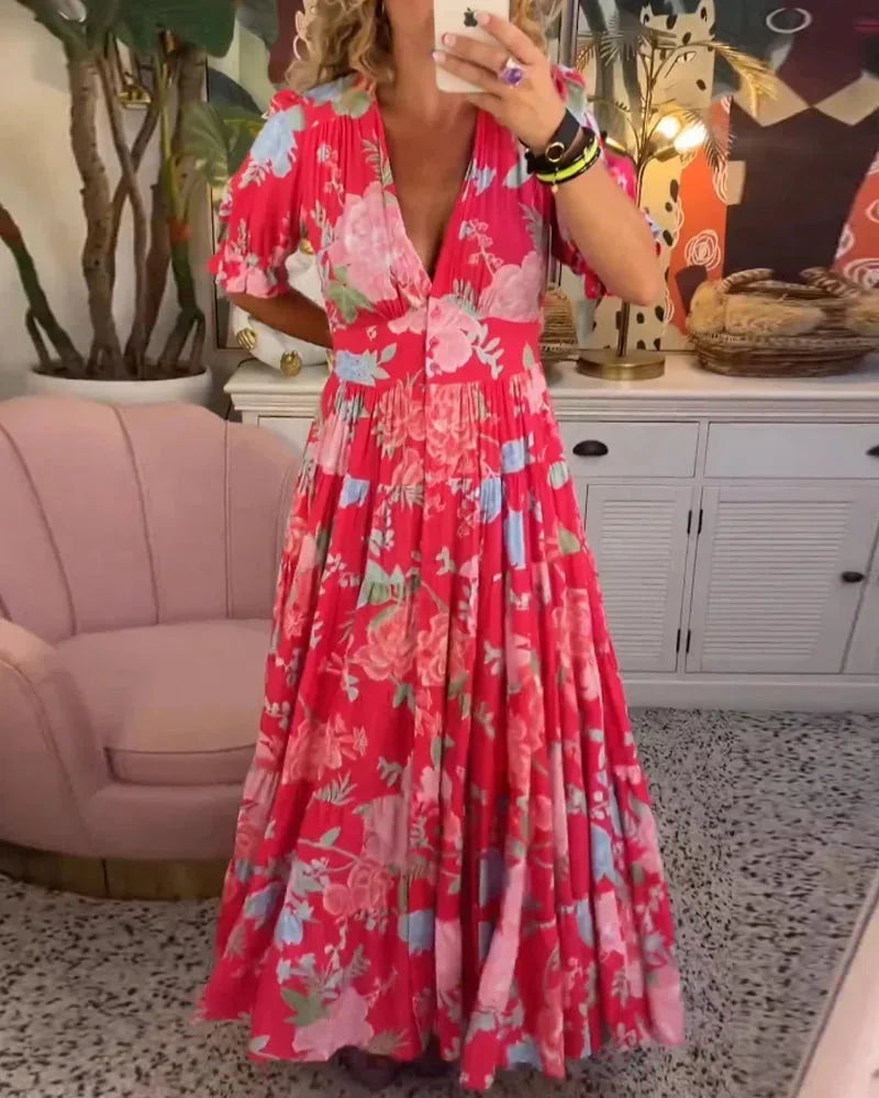 Robe midi femme rouge à motifs floraux, en coton léger, avec manches courtes et taille cintrée pour un style décontracté.