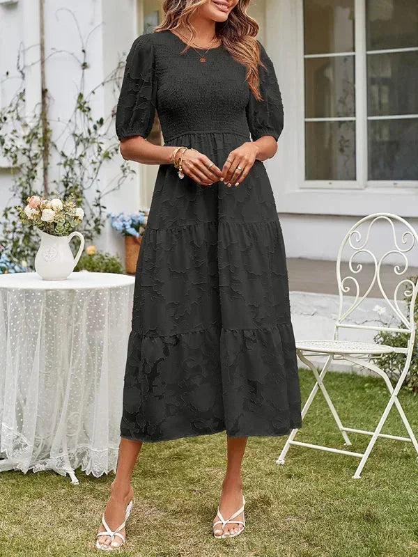 Robe midi femme texturée, manches courtes, volants délicats, en coton doux pour un confort au quotidien.