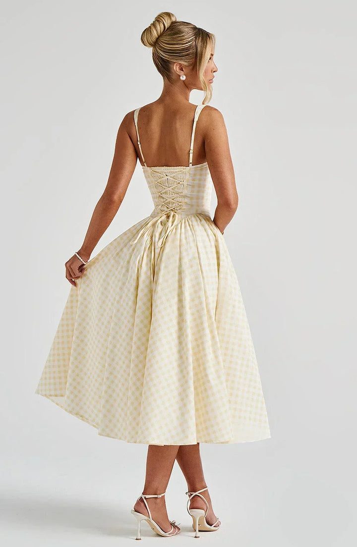 Robe midi femme à carreaux, évasée, avec bretelles larges en coton léger, parfaite pour le printemps et l'été.