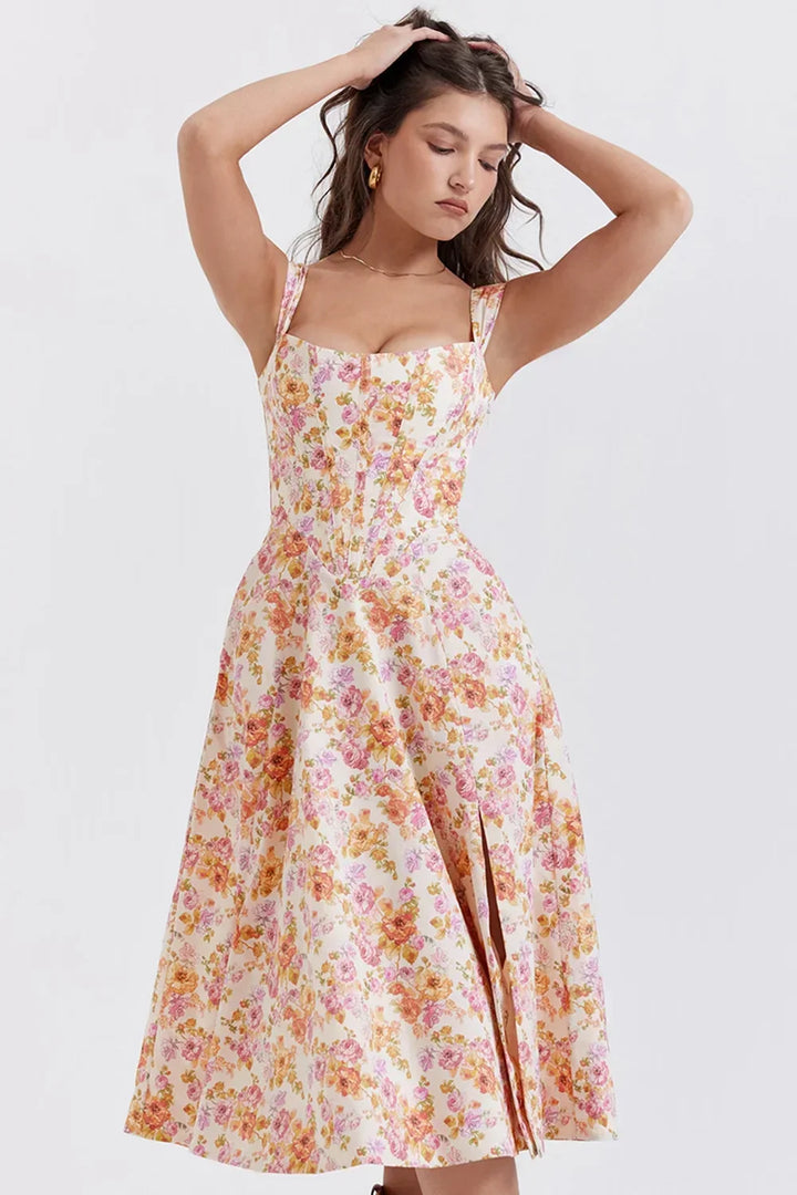 Robe midi à bretelles, imprimé fleuri, fente latérale, en tissu léger, idéale pour l'été décontracté.