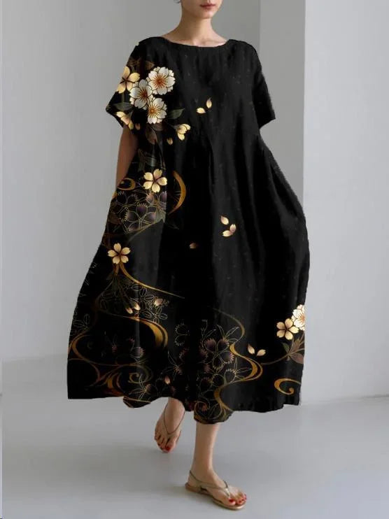 Robe midi à imprimé floral, coupe ample, manches courtes en coton léger, parfaite pour le printemps décontracté.