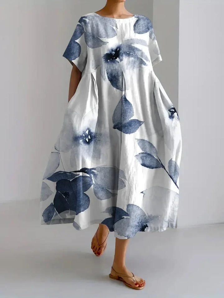 Robe midi à imprimé floral, coupe ample, manches courtes, en coton léger, idéale pour le printemps et les journées…