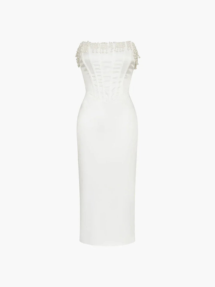 Robe midi ivoire en tissu léger, bustier perlée avec corset, idéale pour soirées et cocktails, style élégant et féminin.