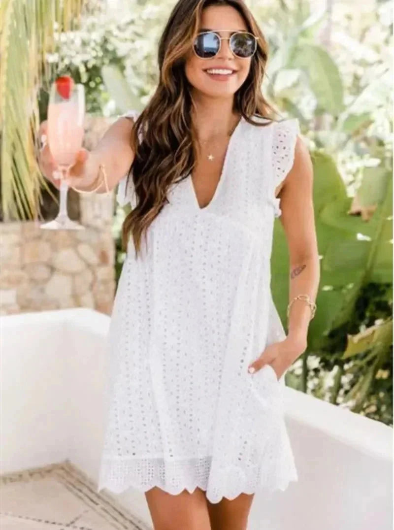 Robe courte en dentelle légère, col V, disponible en plusieurs couleurs, idéale pour l'été et les journées à la plage.