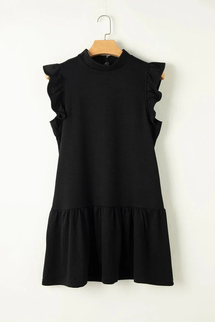 Robe courte noire à volants, manches courtes, coupe trapèze légère en tissu fluide, idéale pour les sorties en soirée.