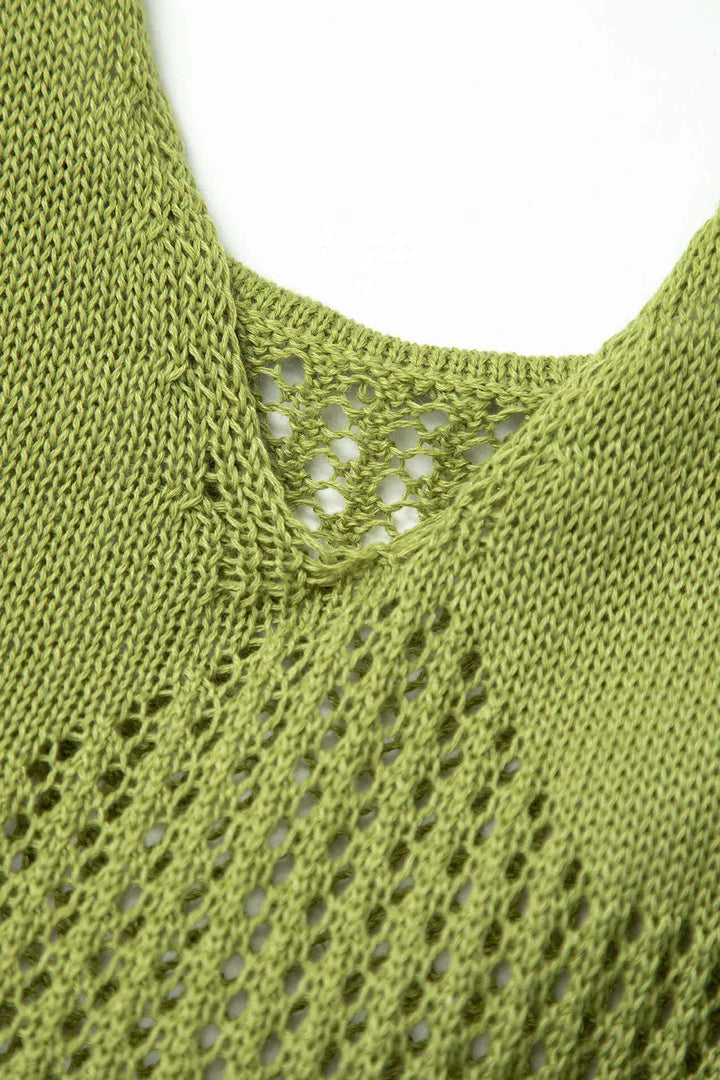 Robe courte en tricot texturé avec volants ludiques, idéale pour les journées d'été à la plage.