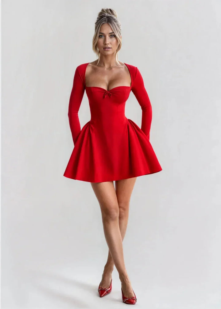 Robe courte évasée en tissu léger, manches longues, décolleté en cœur, disponible en plusieurs couleurs pour vos soirées.