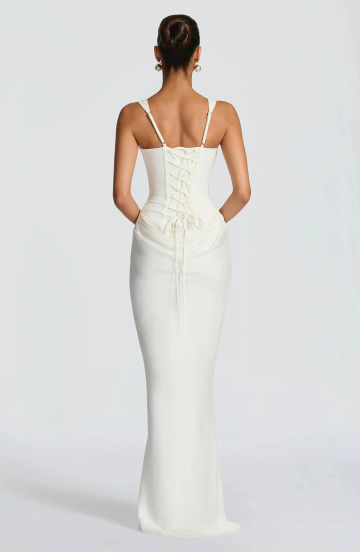 Robe moulante femme dos nu en jersey stretch, avec une silhouette ajustée et un décolleté échancré à l'arrière.