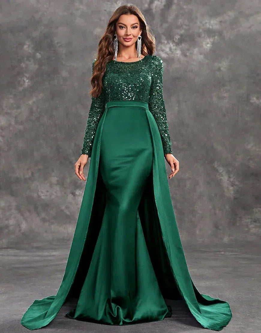 Robe soirée longue verte en satin avec sequins et jupe fluide, parfaite pour des occasions spéciales.