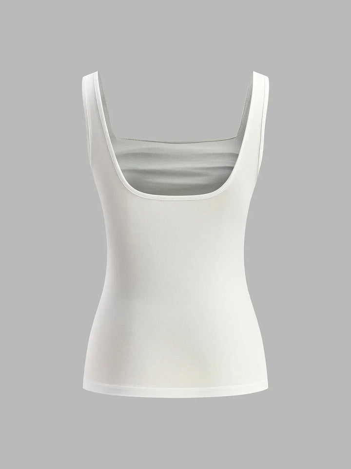 Top femme sans manches en coton léger, avec un fronçage élégant et une coupe décontractée, parfait pour les journées…