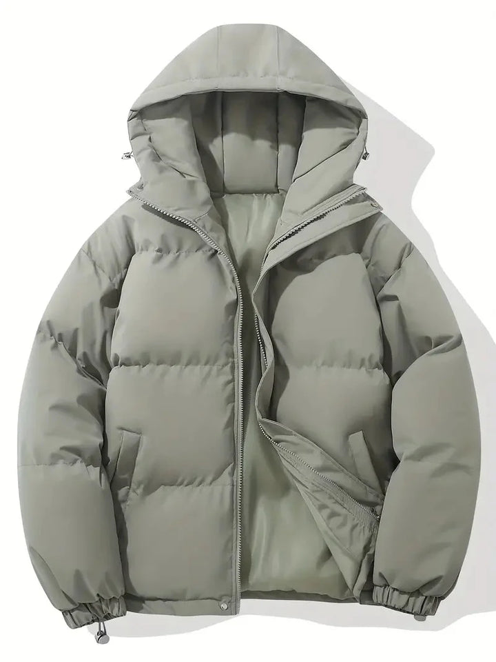Veste d'hiver femme violette avec capuche ajustable, fermeture éclair et doublure en polaire.