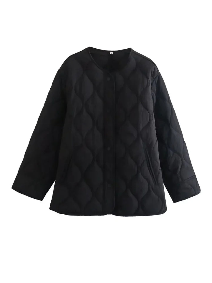 Veste femme ample matelassée noire pour l'hiver, avec fermeture éclair et coupe décontractée.