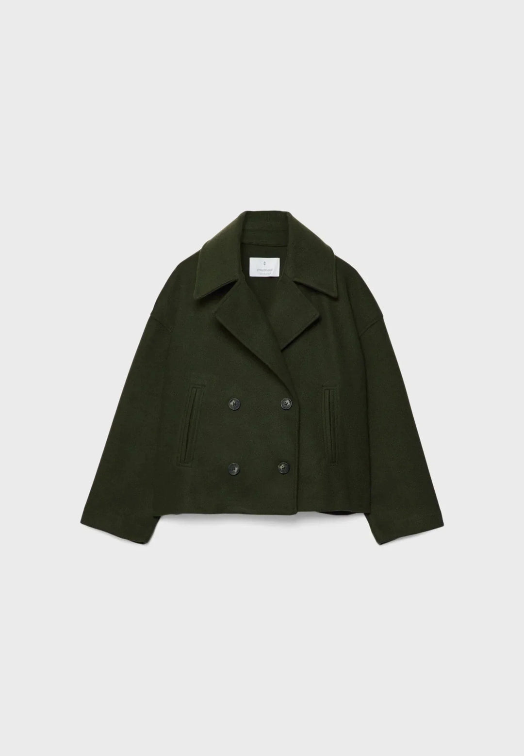 Veste femme courte beige à double boutonnage en mélange de coton, adaptée pour des tenues décontractées et élégantes.