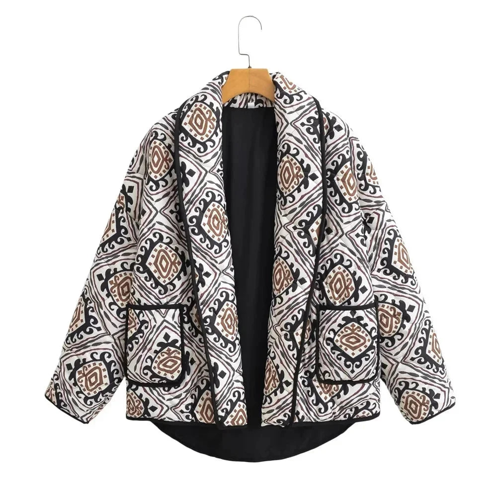 Veste matelassée femme colorée à manches larges, en matériau léger, adaptée pour les journées fraîches.
