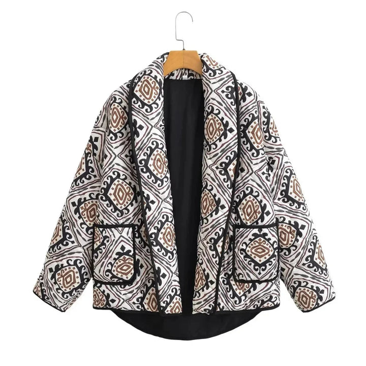 Veste matelassée femme colorée à manches larges, en matériau léger, adaptée pour les journées fraîches.